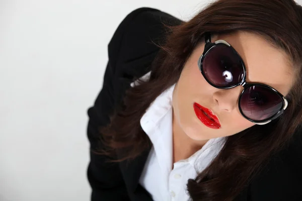Sexy woman wearing sunglasses — Stock Photo, Image