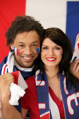 Couple of French soccer fans clipart