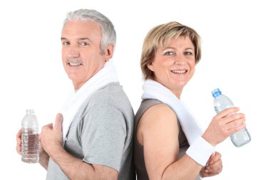 Mature couple drinking water clipart