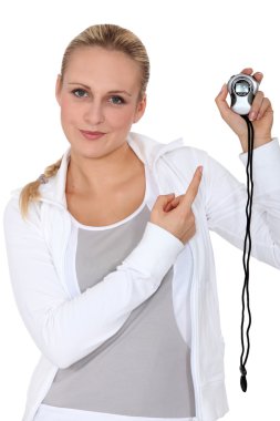 Woman runner with a stopwatch clipart