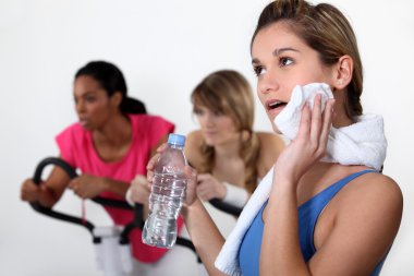 Women working out at the gym clipart