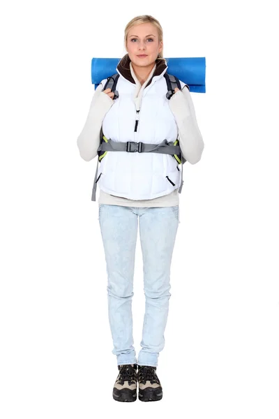 Studio portrait of a female backpacker — Stock Photo, Image