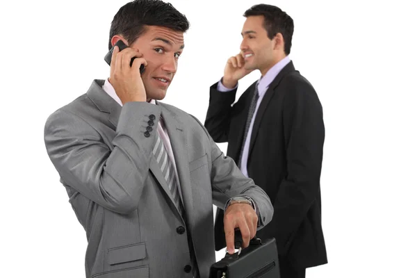 Two businessmen making telephone calls — Stock Photo, Image