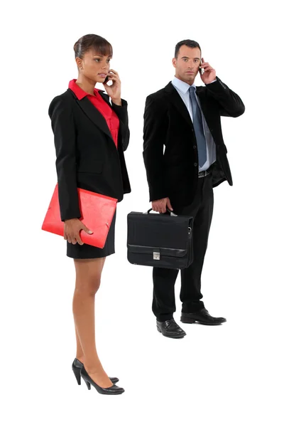 Couple of executives at the phone — Stock Photo, Image