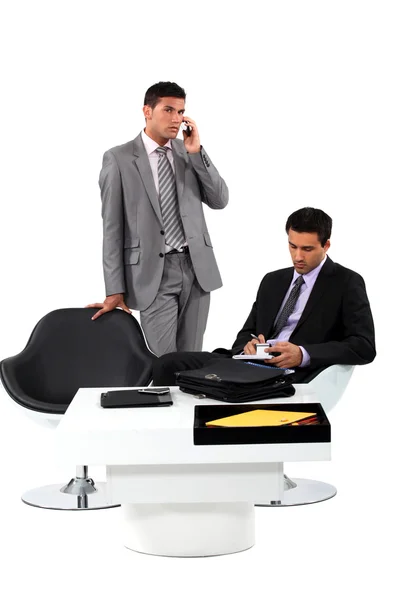 Two businessmen working together. — Stock Photo, Image
