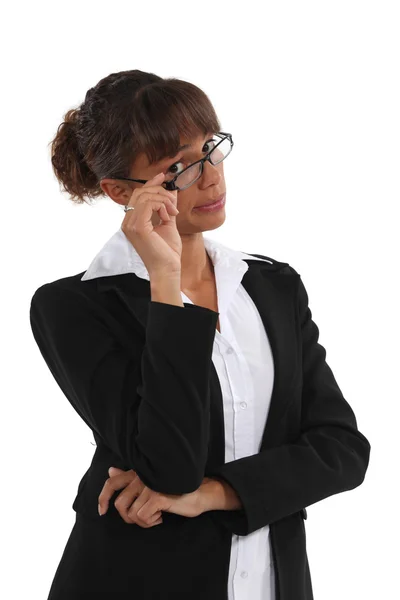 Businesswoman with unimpressed look on face Stock Image
