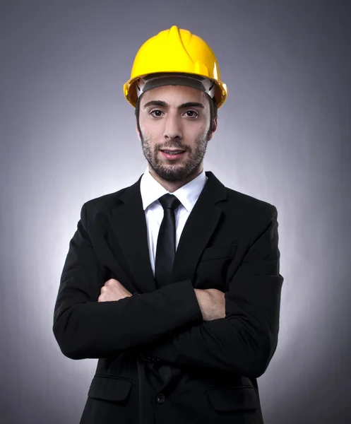Молодий інвестор з будівельним шоломом Ліцензійні Стокові Фото