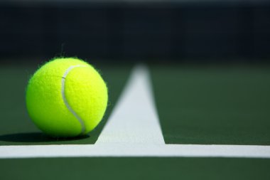 Tennis Ball on the Court clipart