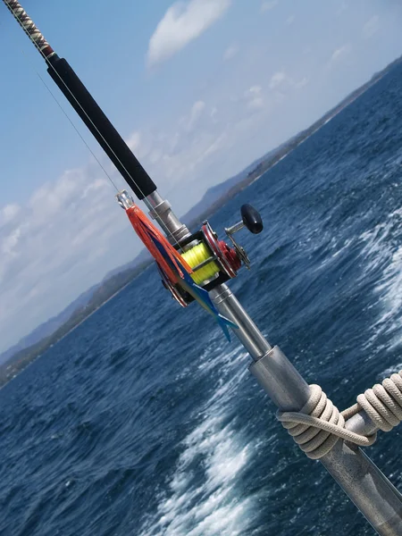 Single fishing-rod on a boat — Stock Photo, Image