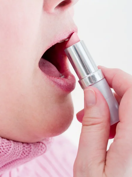 stock image Applying Pink Lipstick