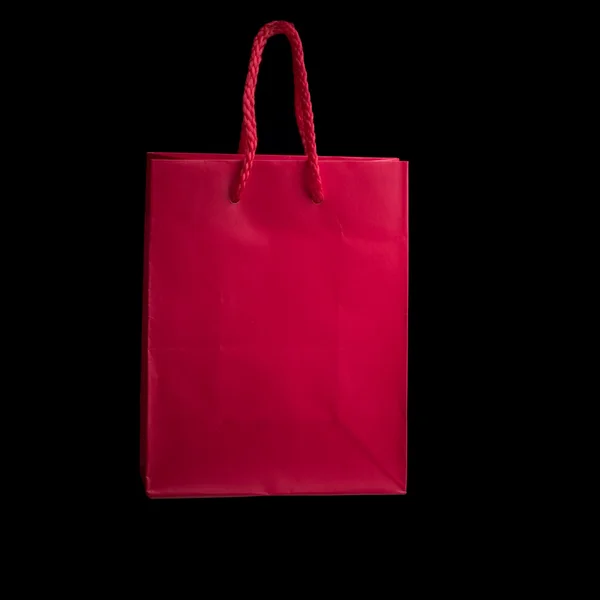Mini shopping bag on black — Stock Photo, Image