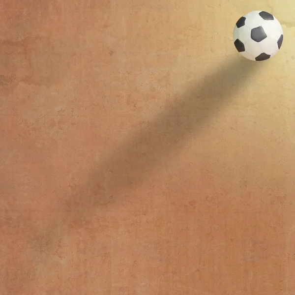 Plasticine voetbal op oude papier achtergrond — Stockfoto