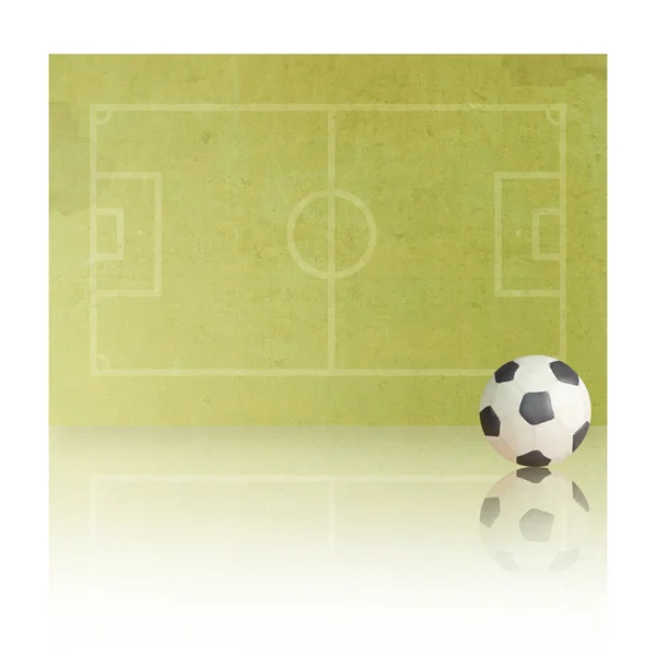 Plasticine Futebol futebol no campo de papel, fundo branco — Fotografia de Stock