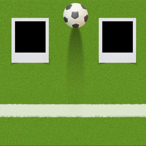 Пластиковый футбол с палкой на фоне травы — стоковое фото
