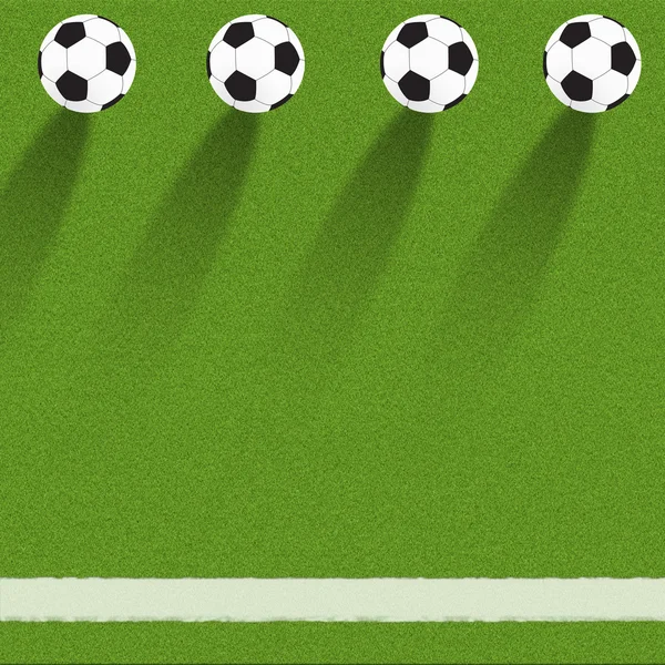 Футбол на травяном фоне — стоковое фото