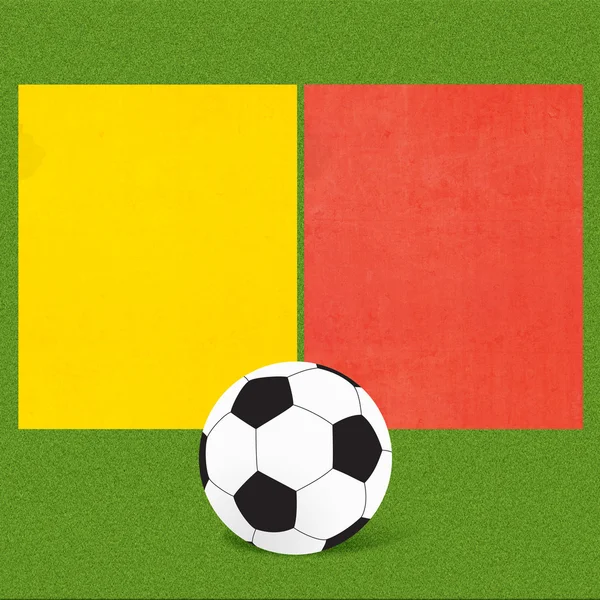Fútbol fútbol con tarjetas de árbitro en el fondo de hierba — Foto de Stock