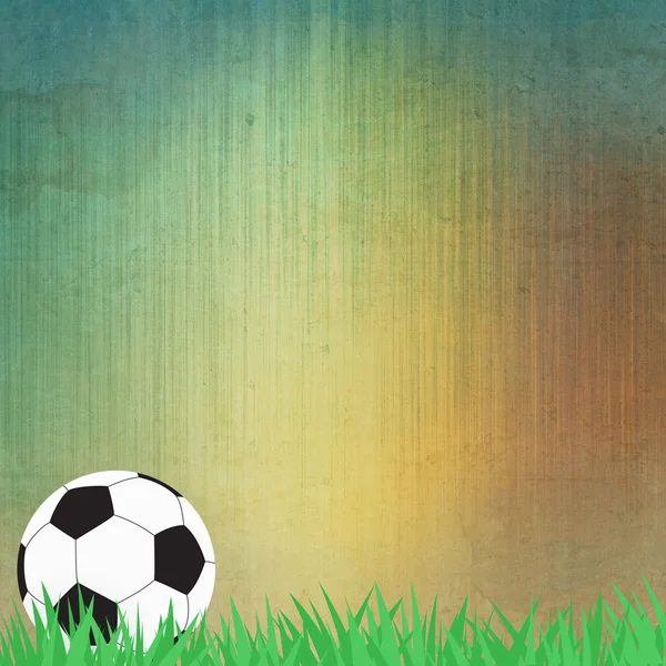 Fußball auf Gras und Papier Hintergrund — Stockfoto
