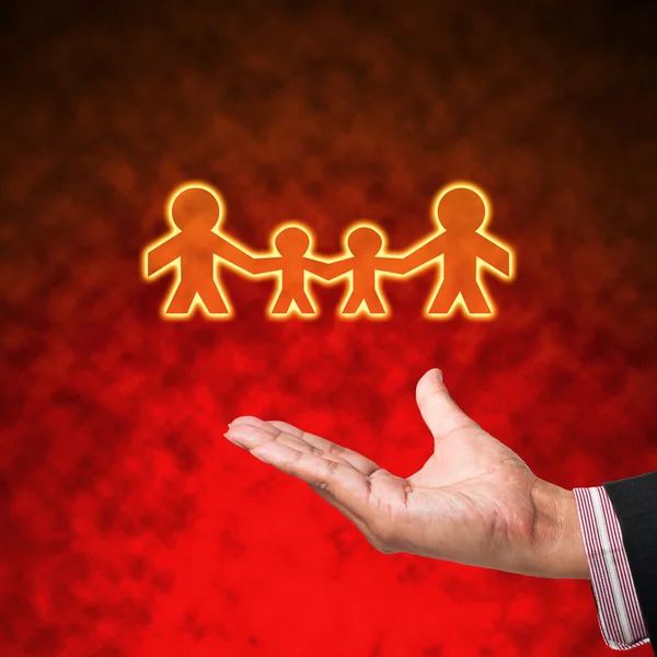 Lichtfamilie mit Hand auf abstraktem Hintergrund — Stockfoto