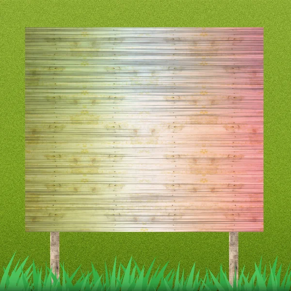 Plakatwand auf Gras Hintergrund und Textur — Stockfoto