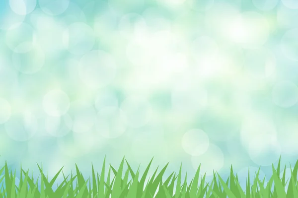 Зелена трава з кольоровим абстрактним тлом — стокове фото