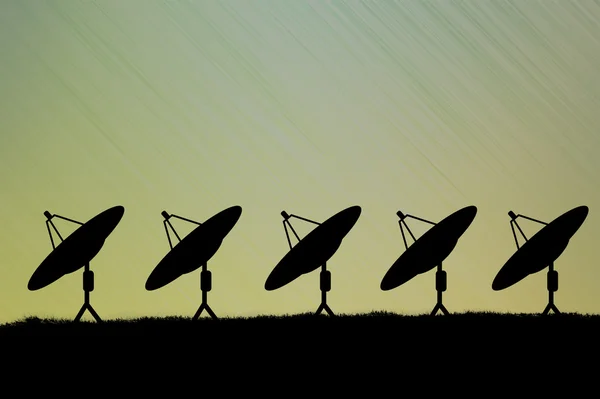 Silhouette of satellite on abstract background — Stock Photo, Image