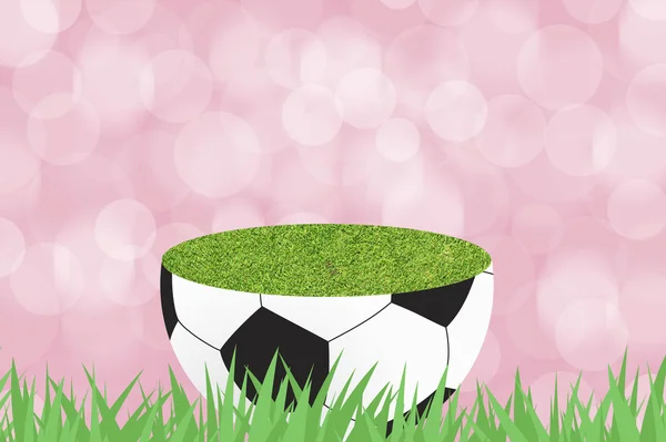 Fútbol con hierba verde sobre fondo abstracto de color — Foto de Stock