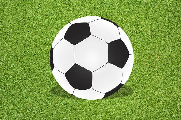 Futbol futbol çim zemin üzerine — Stok fotoğraf