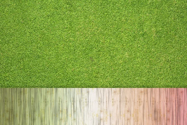 Kleur hout op gras achtergrond en textuur — Stockfoto