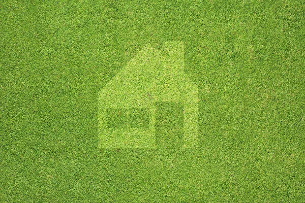 Домашня сторінка на зеленій траві текстура і фон — стокове фото