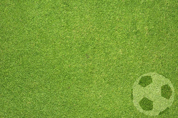 Fotboll på grönt gräs textur och bakgrund — Stockfoto