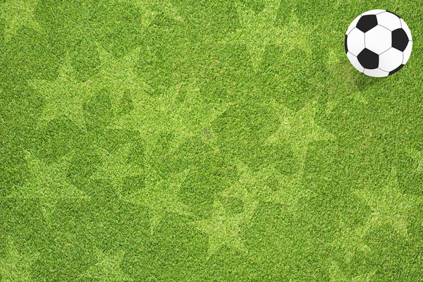 Football soccer on star of grass background — Stock Photo, Image
