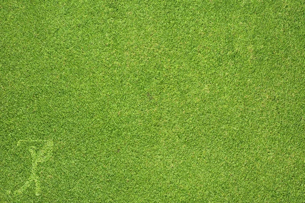 Спортивный гольф на зеленой траве текстуры и фона — стоковое фото