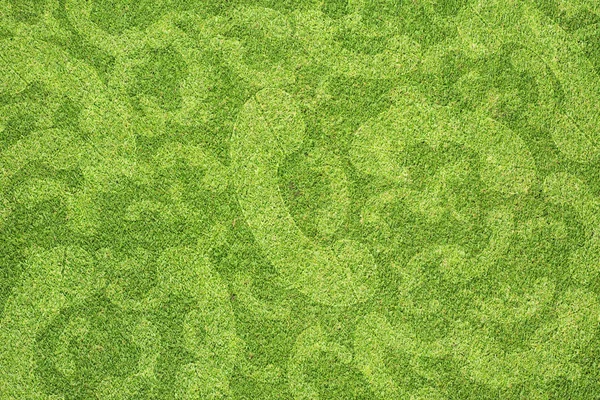 Ícone do telefone na textura de grama verde e fundo — Fotografia de Stock