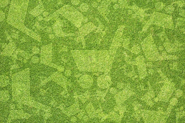 Ícone de carrinho de compras na textura de grama verde e fundo — Fotografia de Stock