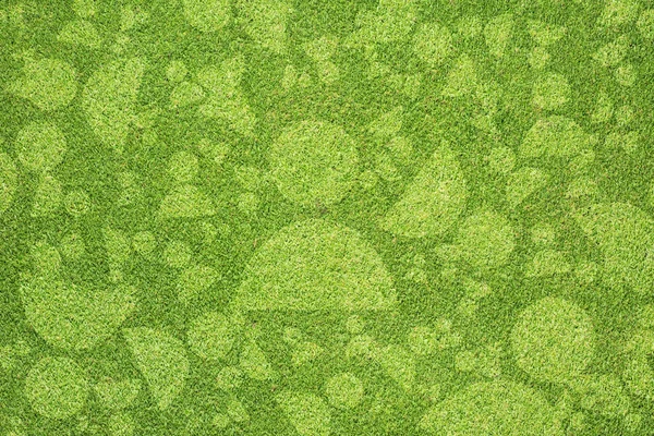 Ikona na zelené trávě — Stock fotografie