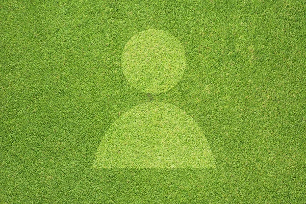 Икона на зеленой траве — стоковое фото