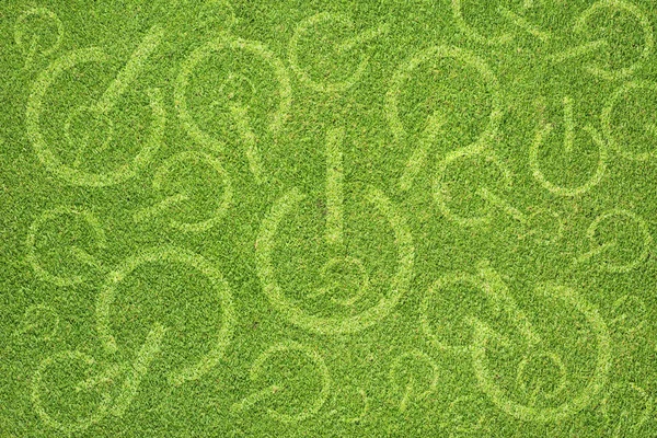 Ícone de desligamento no fundo de grama verde — Fotografia de Stock