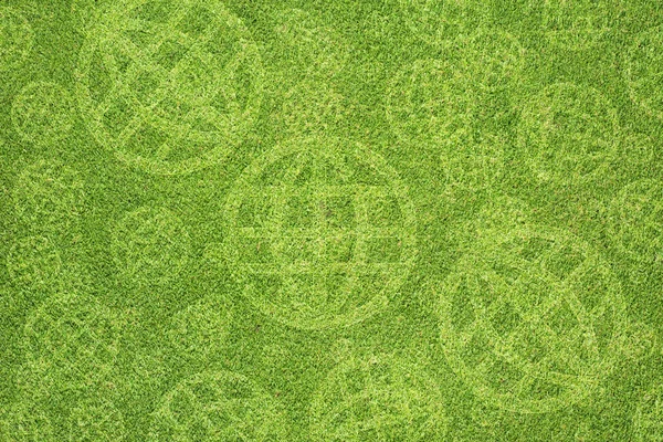 Global pictogram op groen gras achtergrond — Stockfoto