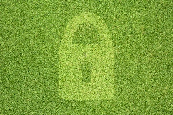 Ikona klíče na zelené trávě pozadí — Stock fotografie