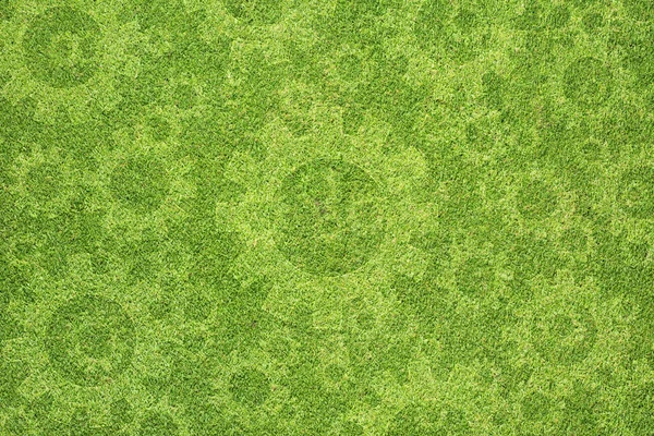 Gears icon on green grass background — Stock Photo, Image