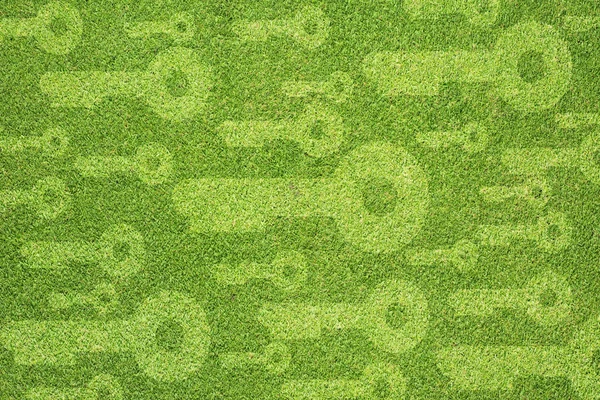 Yeşil çim dokusu ve arka plan üzerinde anahtar simgesi — Stok fotoğraf
