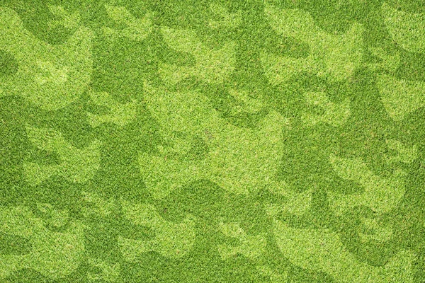 Peaceicon on green grass texture and background — Stock Photo, Image