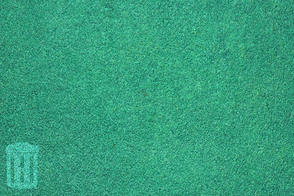 Trash op blue grass textuur en achtergrond — Stockfoto