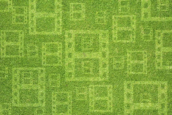 Пленка на зеленой текстуре травы и фоне — стоковое фото