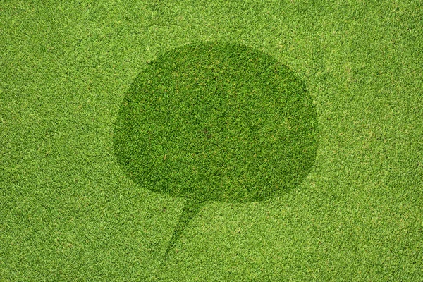 Kommentar-Symbol auf Textur und Hintergrund von grünem Gras — Stockfoto