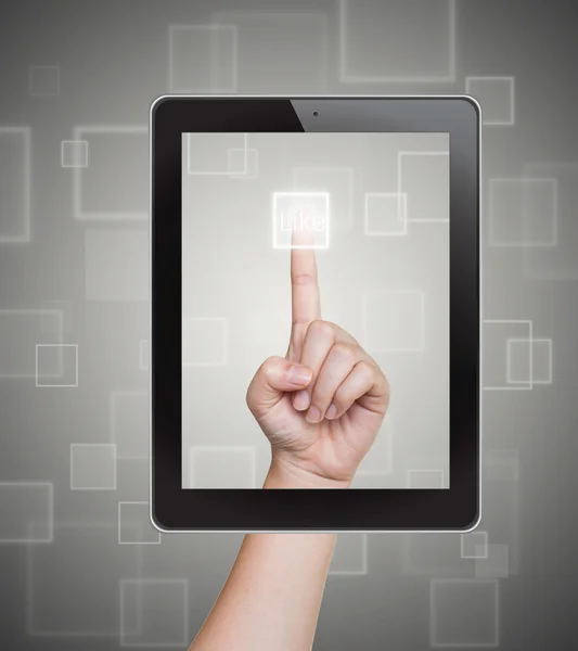 Hand duwen als knop van de Tablet PC op een touchscreen — Stockfoto