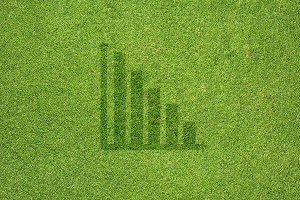 Ícone de gráfico em textura de grama verde e fundo — Fotografia de Stock