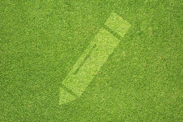 Pencil icon on green grass texture and background — Stock Photo, Image