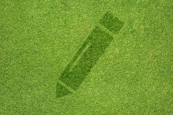 Ikona ołówka na zielonej trawie tekstury i tła — Zdjęcie stockowe