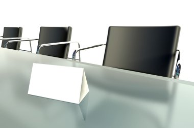 Conference table and empty place card on white background